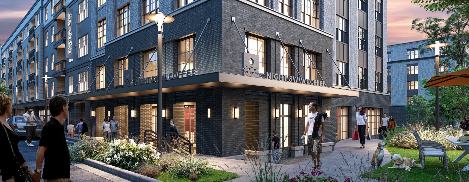 High-end apartment co-working space with built-in coffee bar, shared work tables, modern lighting, and indoor greenery at Garten apartments in LoSo Charlotte.